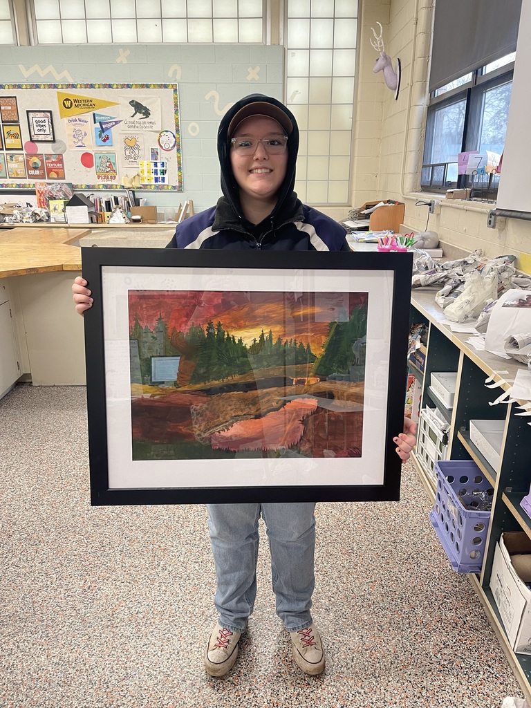 Student holding acrylic painting that will be featured at Kalamazoo Art Institute!