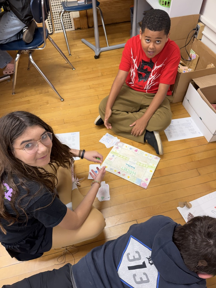 Students playing a game made by their peers.