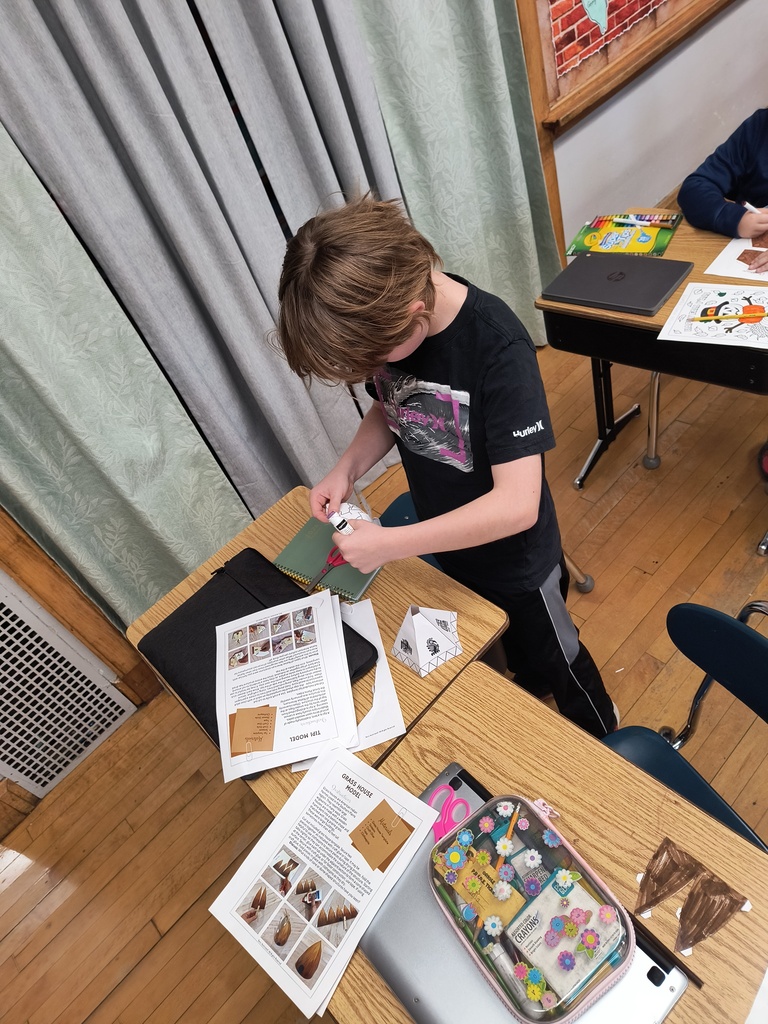 Students creating 3d models of Native American homes