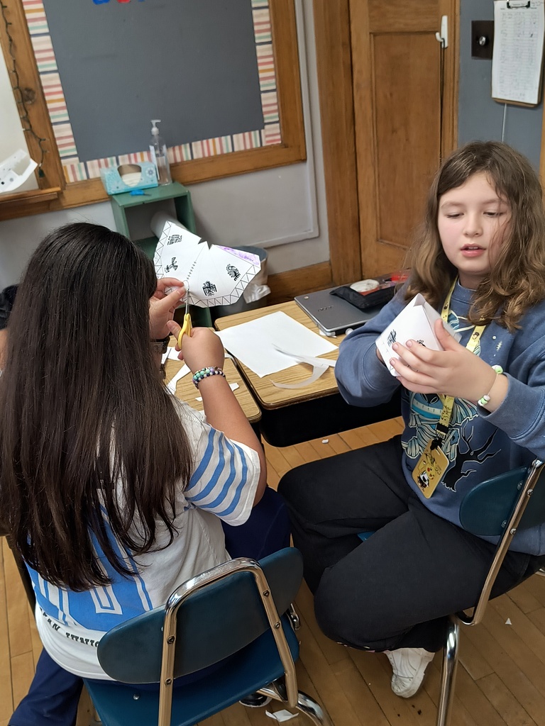 Students creating 3d models of Native American homes