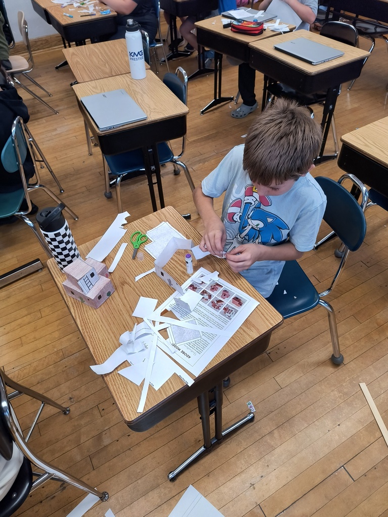 Students creating 3d models of Native American homes