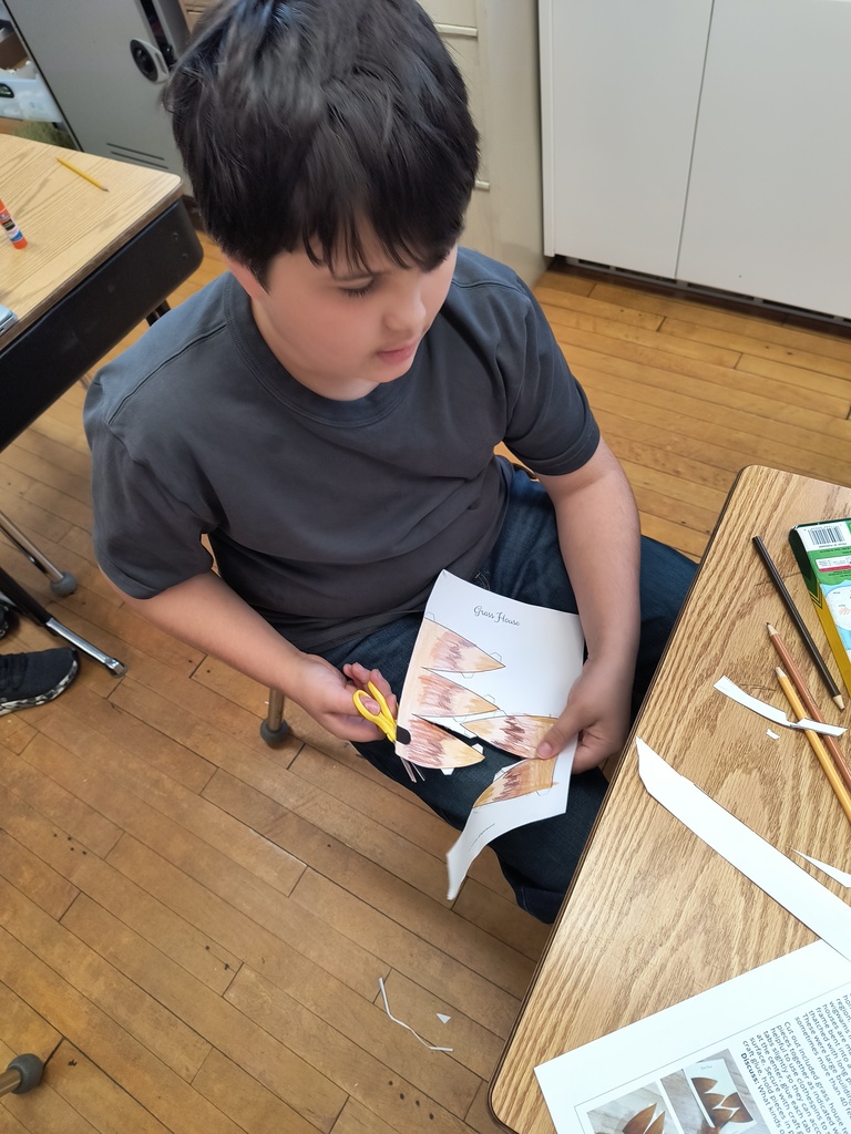 Students creating 3d models of Native American homes