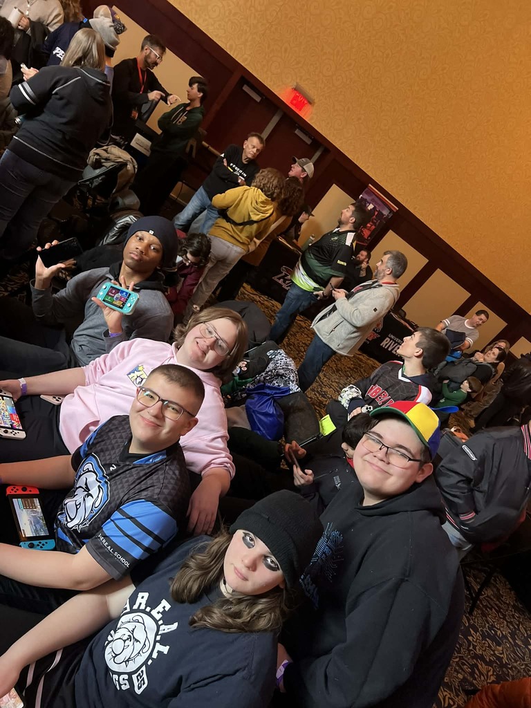 REAL school players taking a group photo at the state tournament.