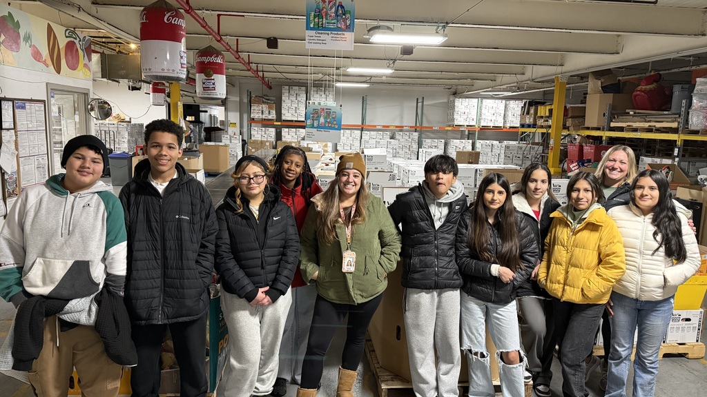 Mitchell students posing for a group photo during their donation drop off at the Racine County Food Bank.
