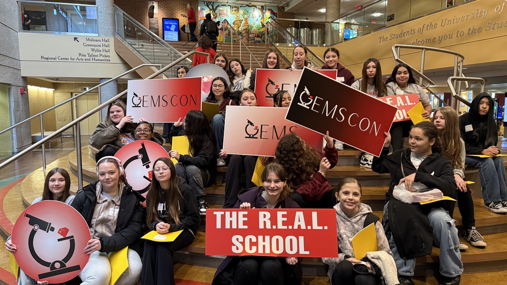 Students from The R.E.A.L. School pose for a group photo at the GEMS Conference.