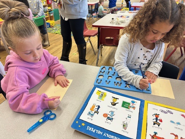 Students building writing and letter recognition skills. (2)