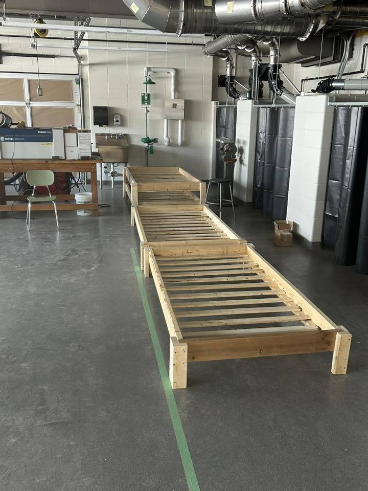 Students making bed frames.