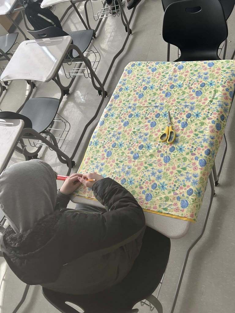 Students making blankets.