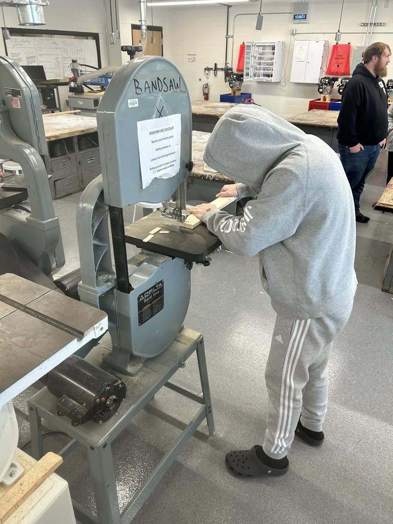Students making bed frames.