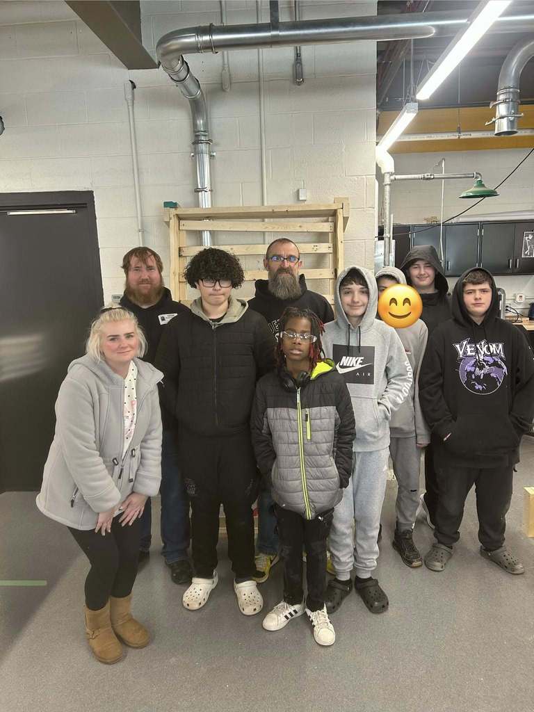 Students making bed frames.