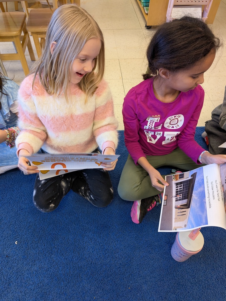 Meagan DeGroot, of Hunzinger Construction, visiting classrooms at Goodland Montessori and SC Johnson Elementary for National Women in Construction Week.