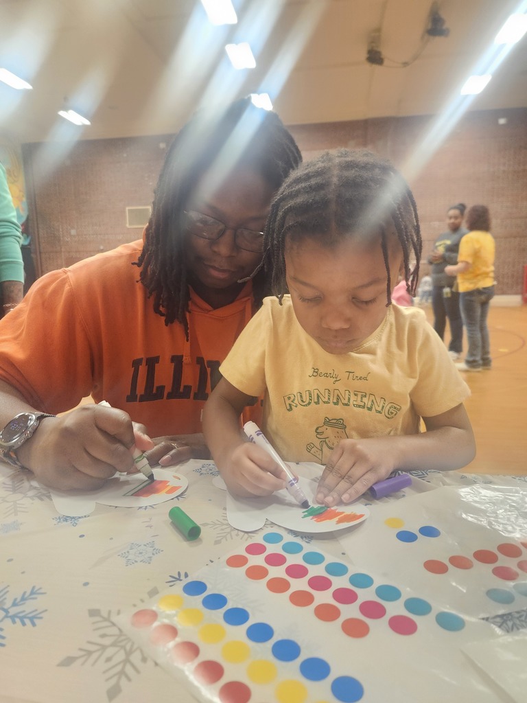 Father and son coloring together.