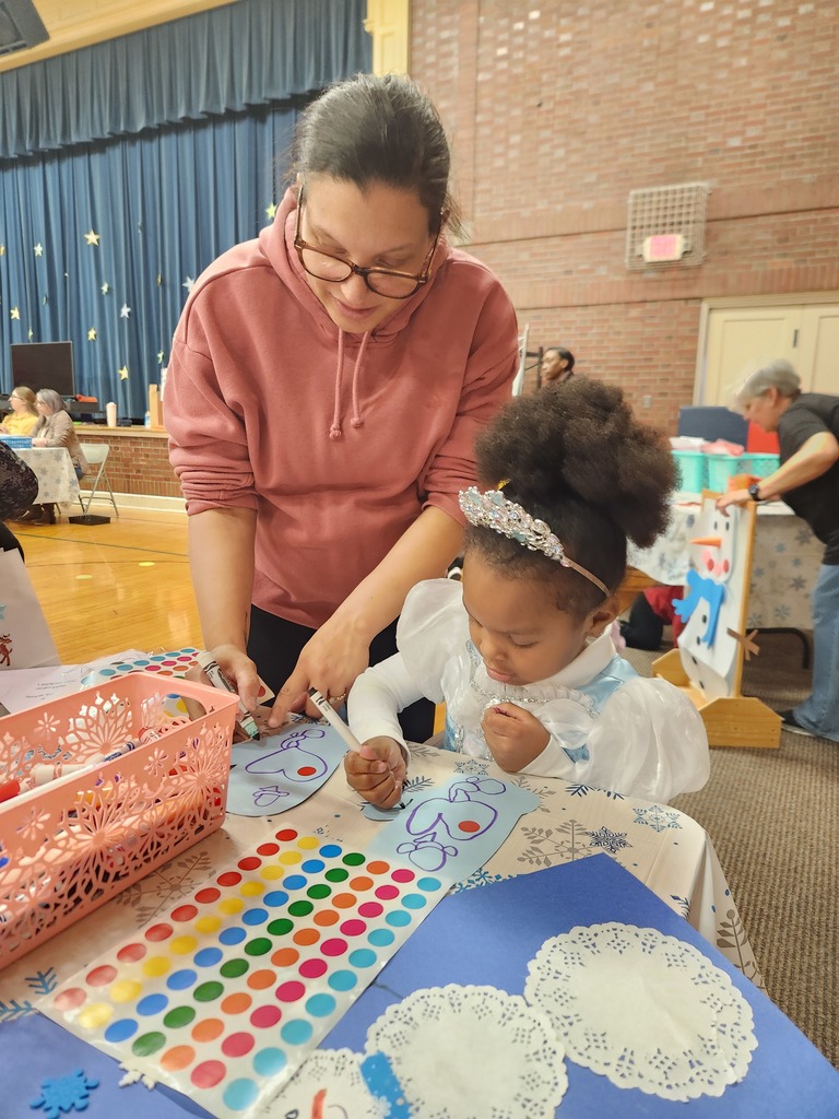 Mother and daughter color together.