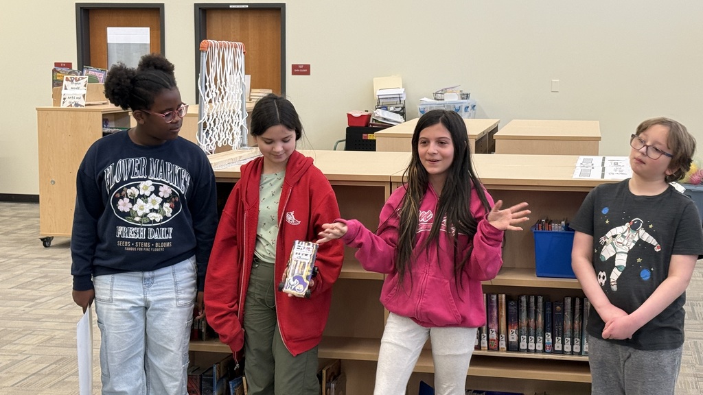 Four Knapp students give their presentation