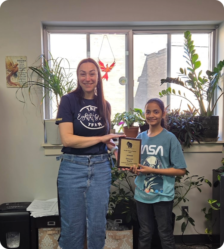 Principal Wroblewski and student Omanshi Gupta