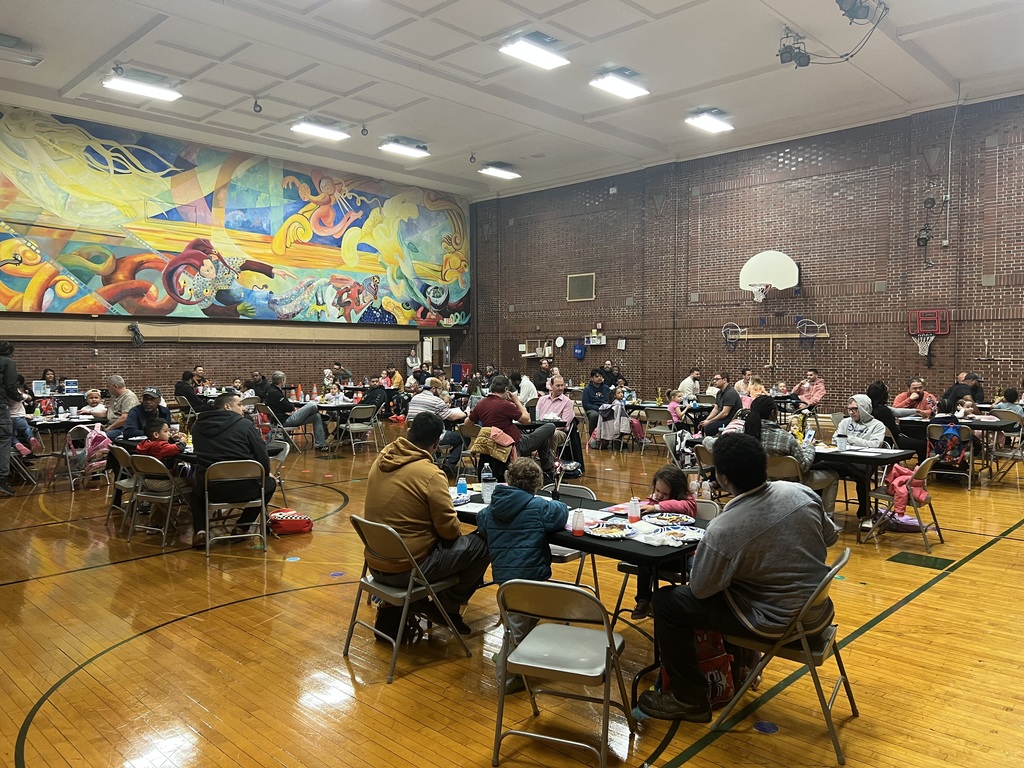 All Pro Dads Breakfast -families seated for breakfast.