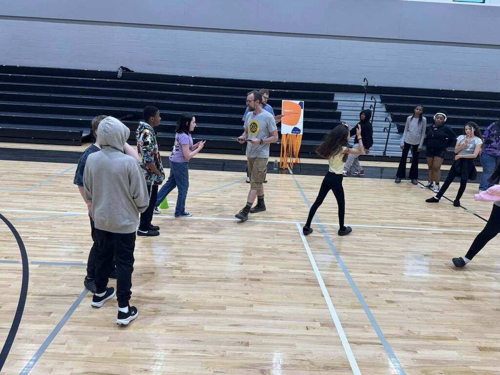 Students play a game as part of the Everfi celebration.