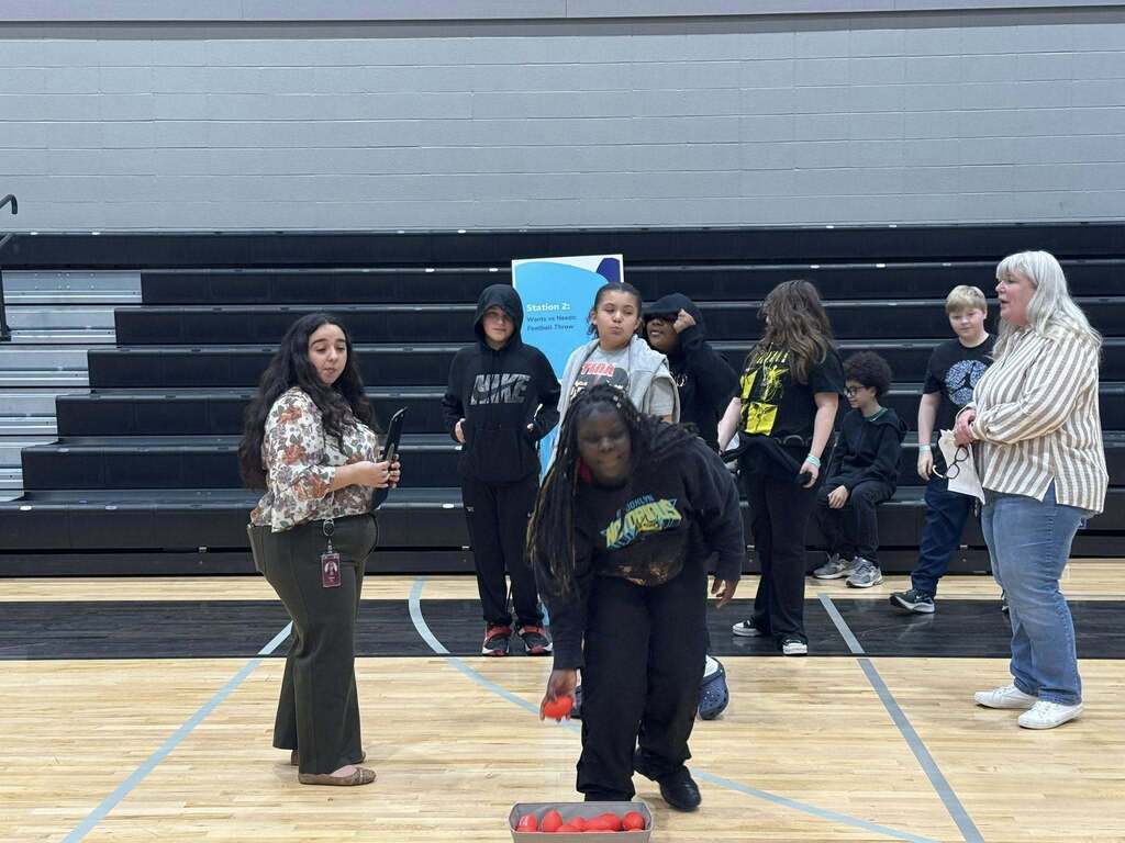 Students play a game as part of the Everfi celebration.