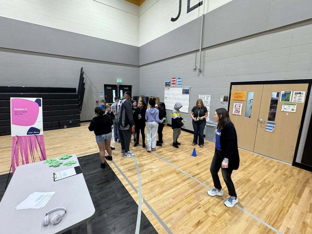 Students play a game as part of the Everfi celebration.