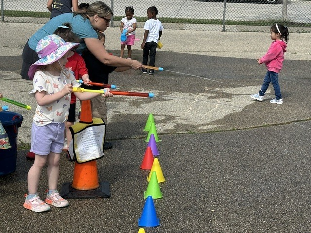 Students and students playing water games.