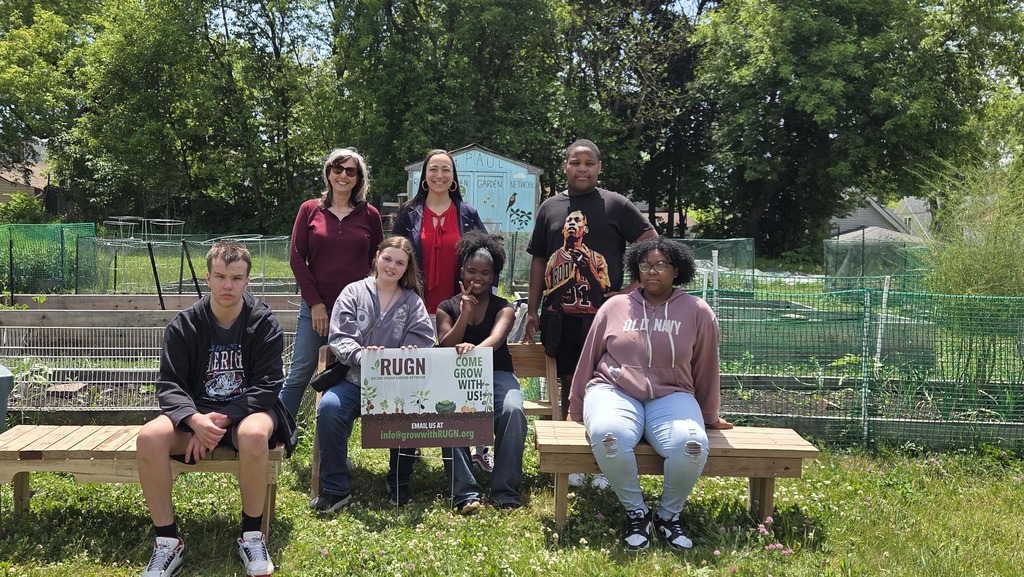 Photo of RUGN President Donna Delmar, Starbuck International K-8 Principal, Sara Wroblewski, and five 8th grade students; Ryder, Audrey, Demiah, AJ, and Ellie