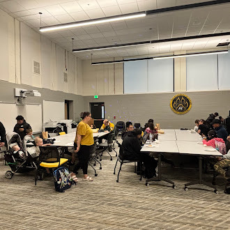 Students and their families at the rise and roar breakfast.