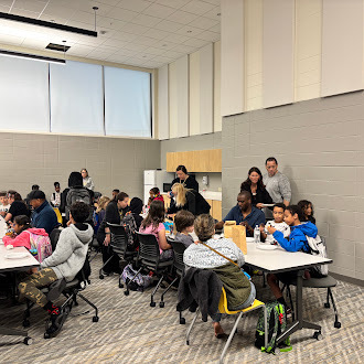 Students and their families at the rise and roar breakfast.
