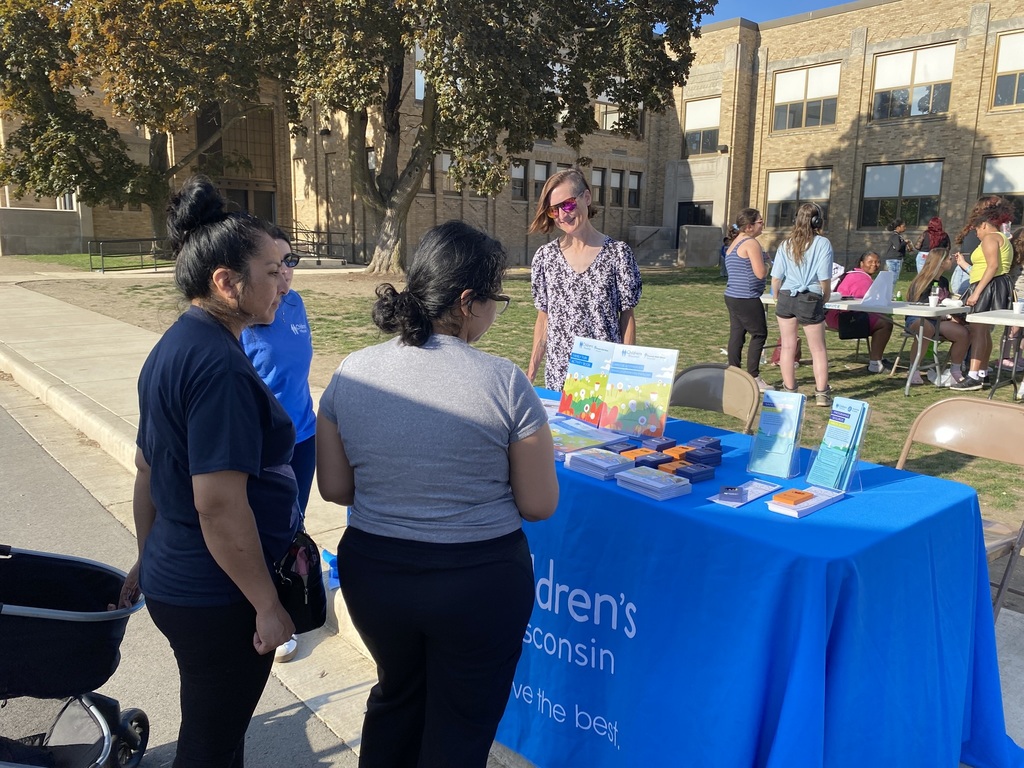 Adults speak with a partner organization, Childrens Wisconsin.