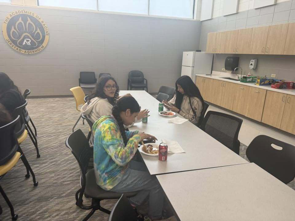 Our students participating in their Wingstop party for meeting their ACCESS testing goals.
