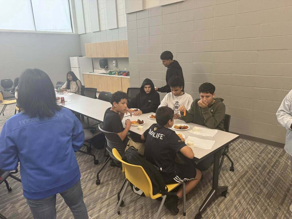 Our students participating in their Wingstop party for meeting their ACCESS testing goals.