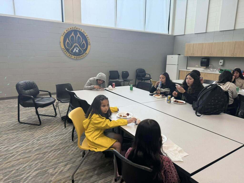 Our students participating in their Wingstop party for meeting their ACCESS testing goals.