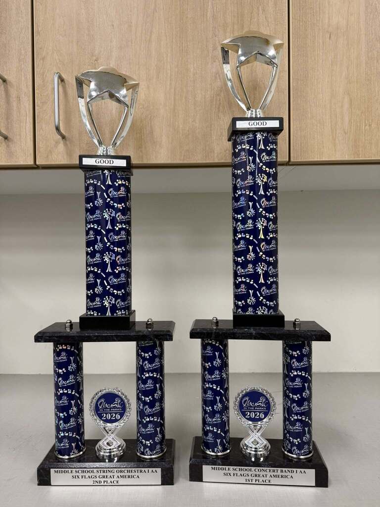 The 1st and 2nd place trophies that our middle school band and orchestra students won at Music in the Parks.