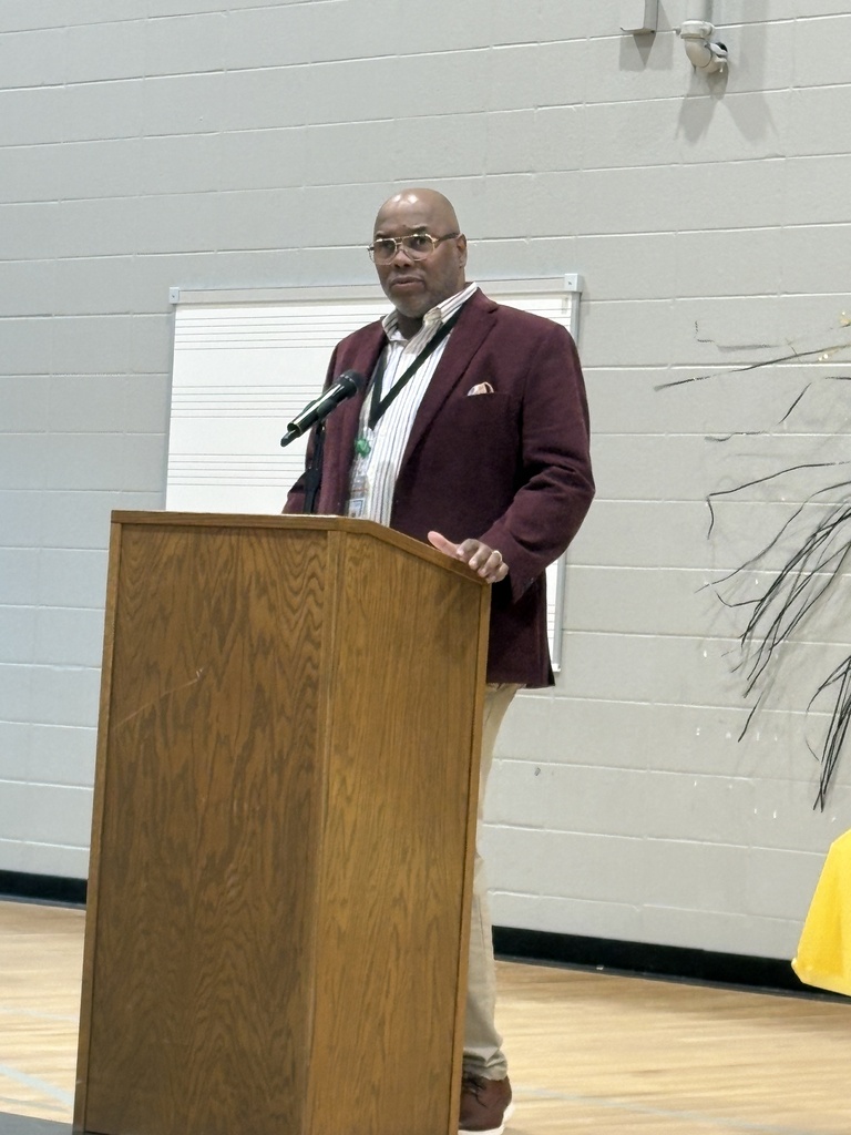 Mr. Ford addresses the 8th grade class.