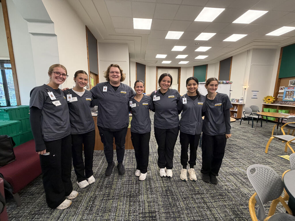 UWM Nursing students in the Mitchell Family Resource Center before their annual vision screenings with students.
