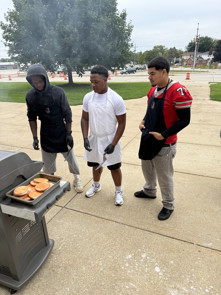 Students cooking in culinary lab