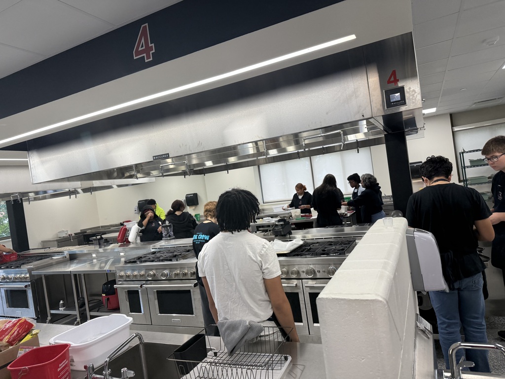 Students cooking in culinary lab