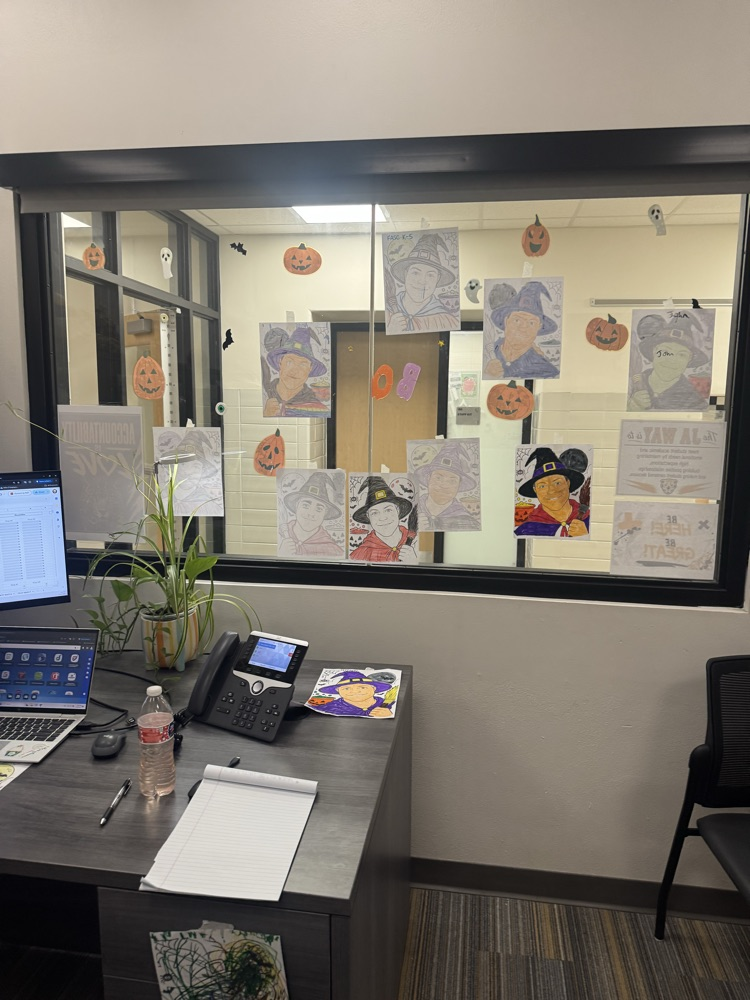 pictures in Paproth’s office