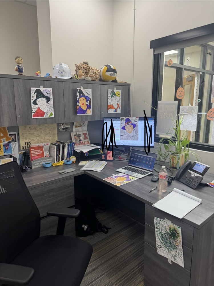 pictures in Paproth’s office