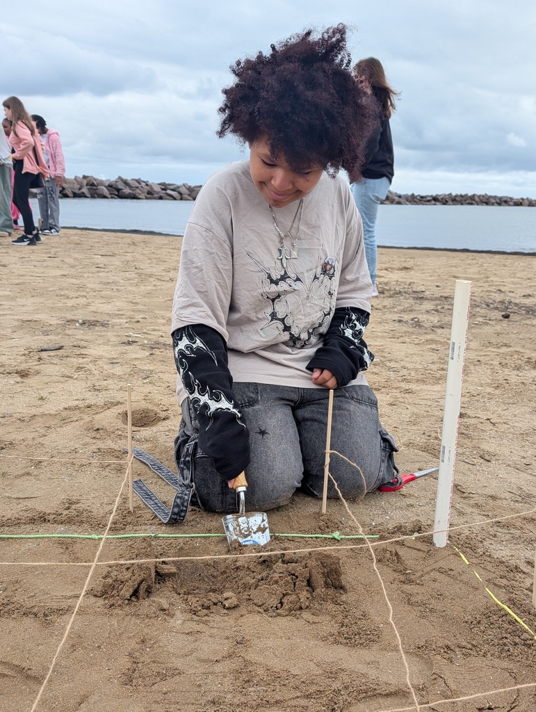 A Nova Academy student on their archaeological dig field trip.