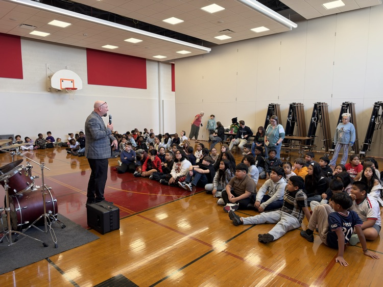 Principal Curt talking to the kids. 