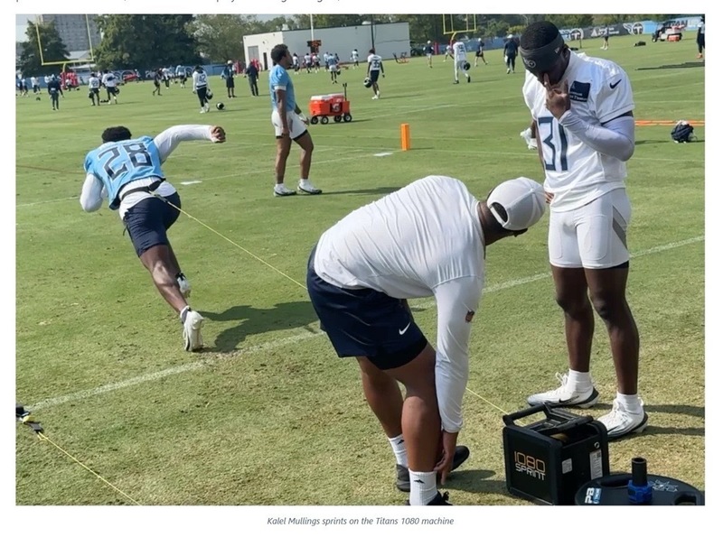 Alex Rogers (back to camera) conducts weekly speed testing with Titans players.