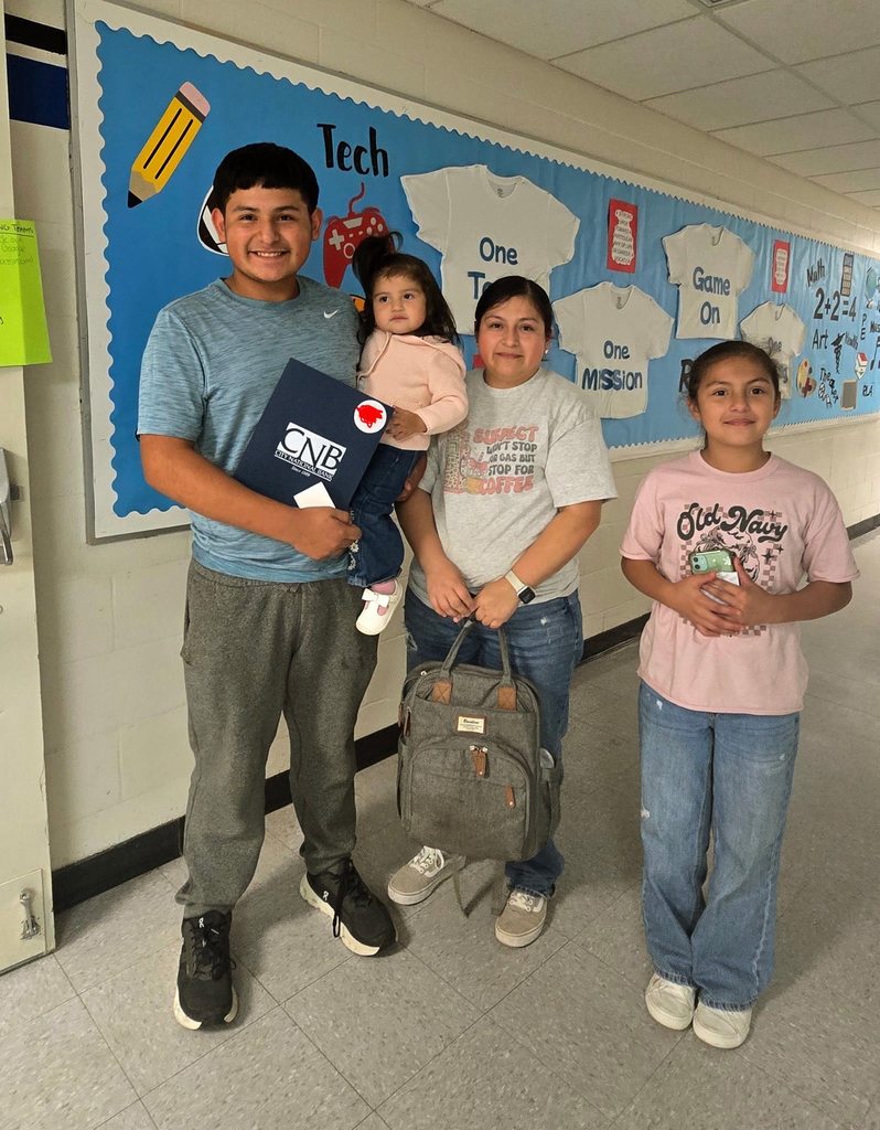 Family Standing together with bank documents after child set up his first savings account