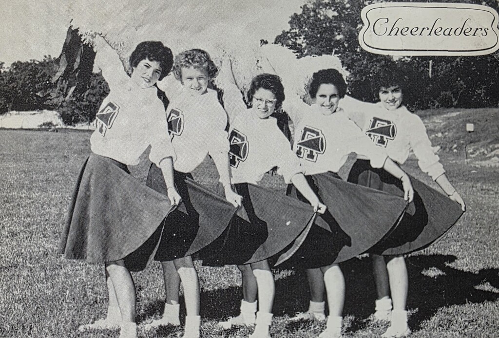 Old pictures of Rains ISD Band, Cheer, and Drill Team. Celebrating the spirit of tradition and wildcat pride for Homecoming Week.