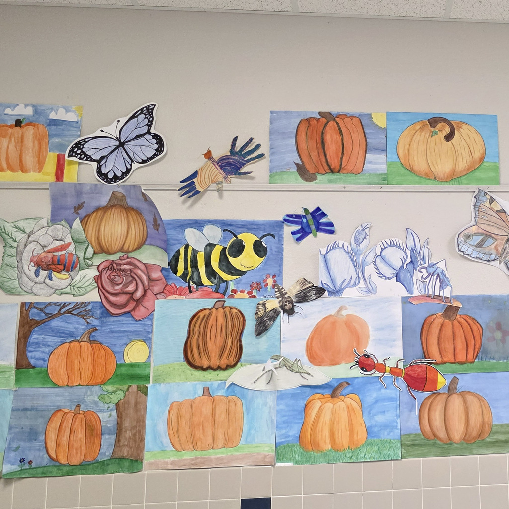Pumpkin artwork from the high school art class