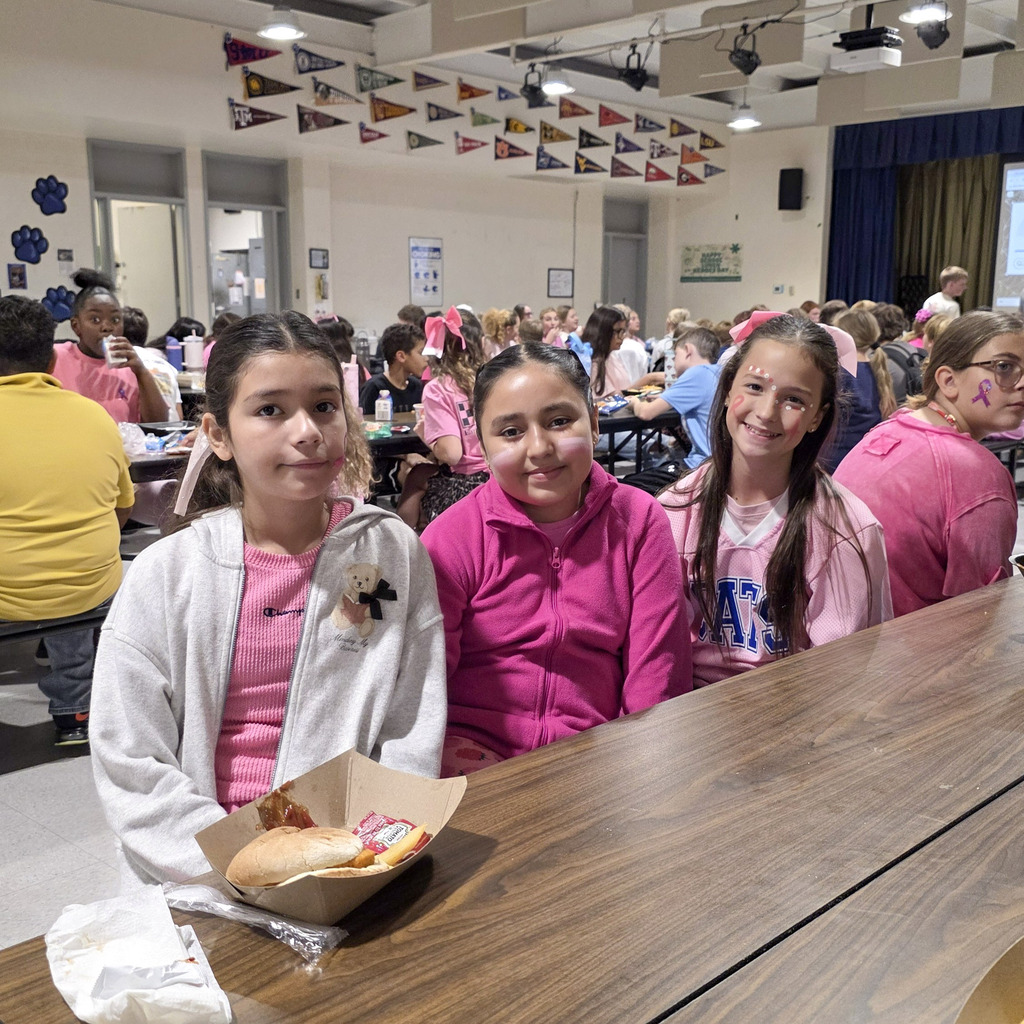 Junior High Students smiling for a picture at the JH Cafeteria during lunch time