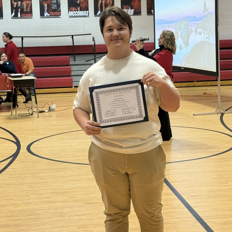 student receiving an award for perfect score on AP test
