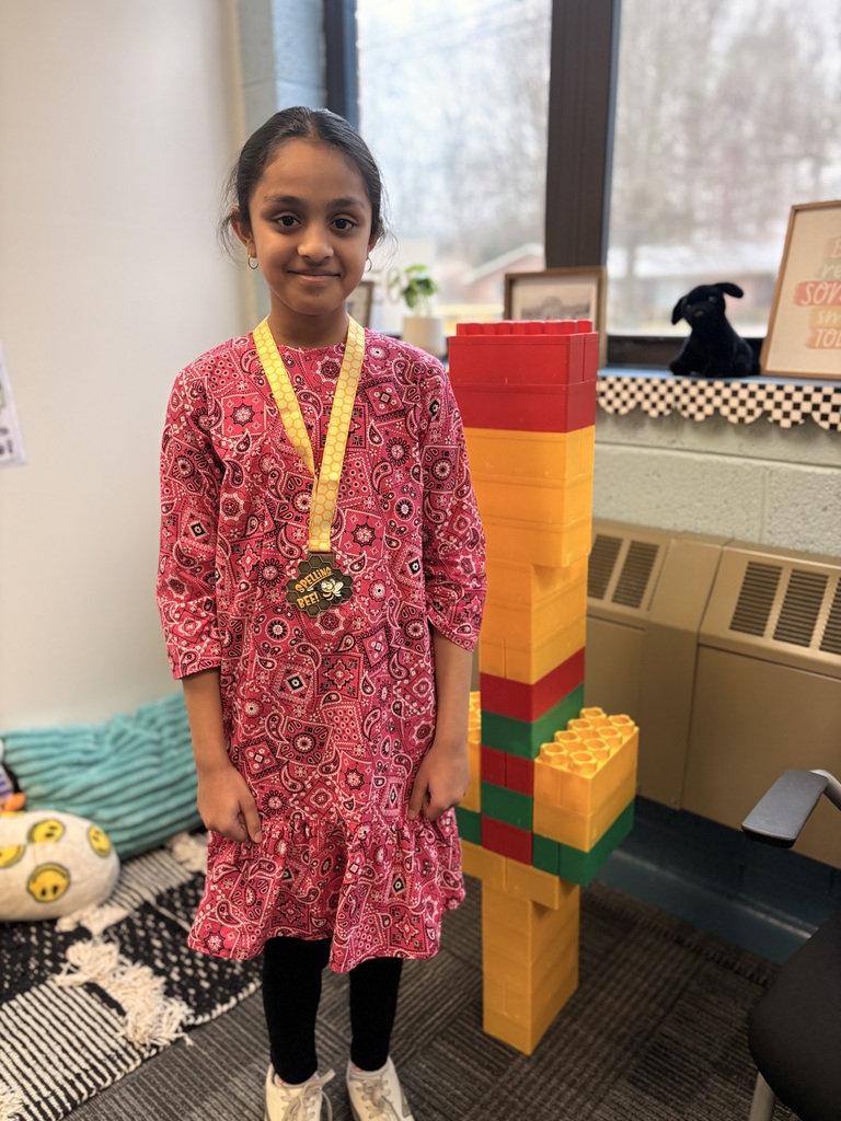 Female student with medal 