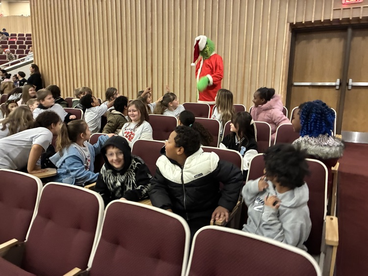 the grinch taking to students