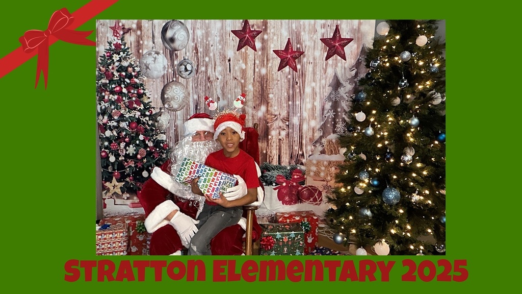 Stratton Elementary Christmas Party 2025 Picture of Student and Santa