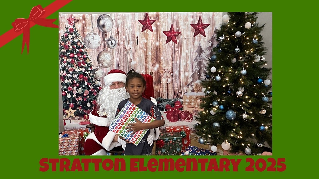Stratton Elementary Christmas Party 2025 Picture of Student and Santa